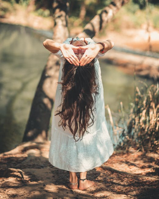 Person meditating in a yoga pose